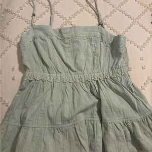 Light green top, size small. Brand new, never worn.